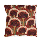 Modern outdoor pillow with art deco fan flowers in burgundy, cream and coral with green leaves on brick red