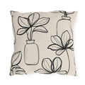 Black line-drawn plants in bottle vases on a cream outdoor pillow