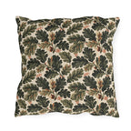 Deep green oak leaves and acorns on cream outdoor pillow