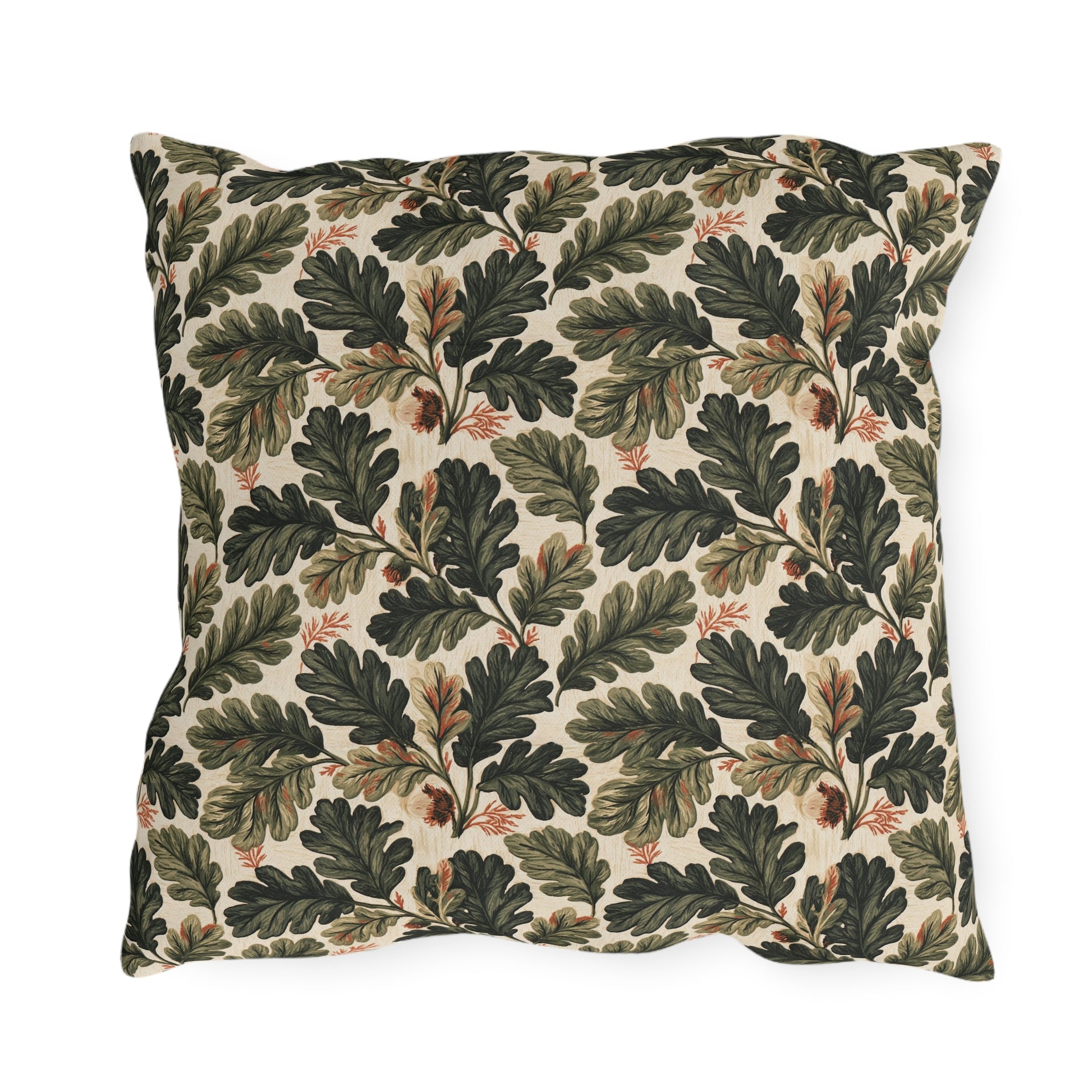 Deep green oak leaves and acorns on cream outdoor pillow