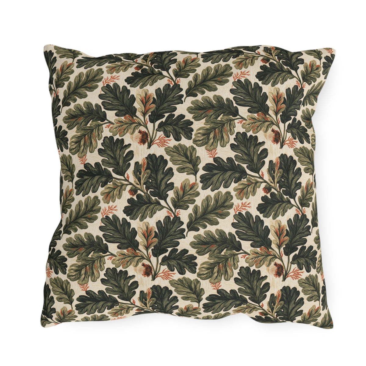 Deep green oak leaves and acorns on cream outdoor pillow