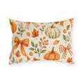 Fall outdoor lumbar pillow with watercolor orange and cream pumpkins, maple leaves, berries and gingham bows on cream