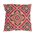 Boho outdoor pillow with Moroccan medallions in emerald green, orange and cream on raspberry pink