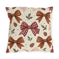 Christmas outdoor pillow with watercolor brown satin bows, red gingham bow, pinecones and holly on cream
