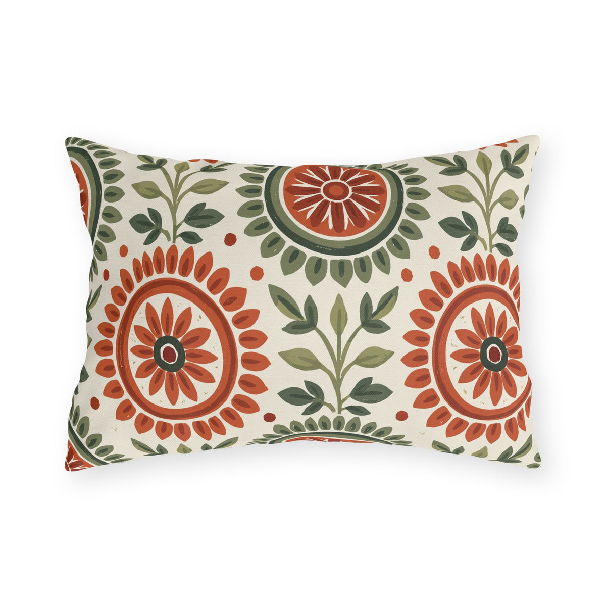 Block print floral outdoor lumbar pillow with folk flower medallions in terracotta and sage green with leafy sprigs on cream