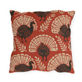Block print turkeys and cream leaf sprigs on a brick red outdoor pillow