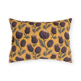 Deep plum artichoke thistles on warm ochre outdoor lumbar pillow