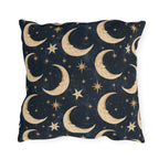 Gold crescent moons and stars on a deep navy outdoor pillow