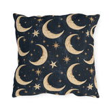 Gold crescent moons and stars on a deep navy outdoor pillow
