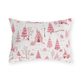 Pink cottages, fir trees and snowdrifts on white outdoor lumbar pillow