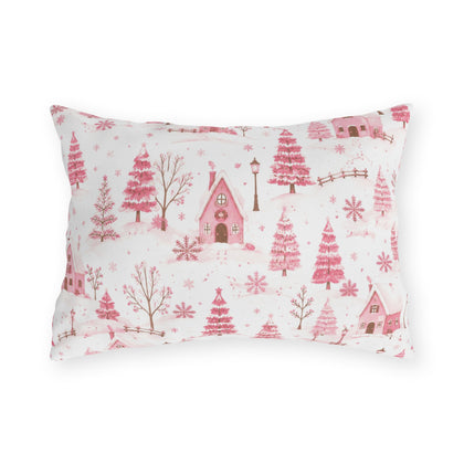 Pink cottages, fir trees and snowdrifts on white outdoor lumbar pillow