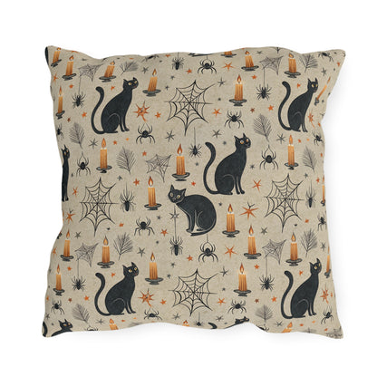 Black cats, lit candles and spiderwebs on oatmeal cream outdoor pillow
