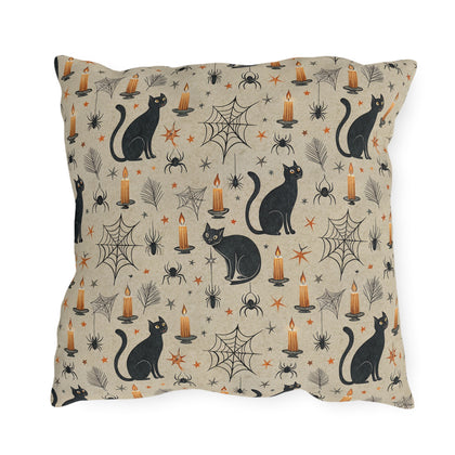 Black cats, lit candles and spiderwebs on oatmeal cream outdoor pillow