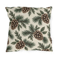 Large pinecones on pine and cedar branches on a cream outdoor pillow