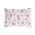 Pink beanies, mittens, cocoa mugs and snowflakes on white outdoor lumbar pillow
