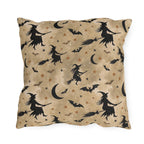 Black witch silhouettes on broomsticks with bats and crescent moons on tan outdoor pillow