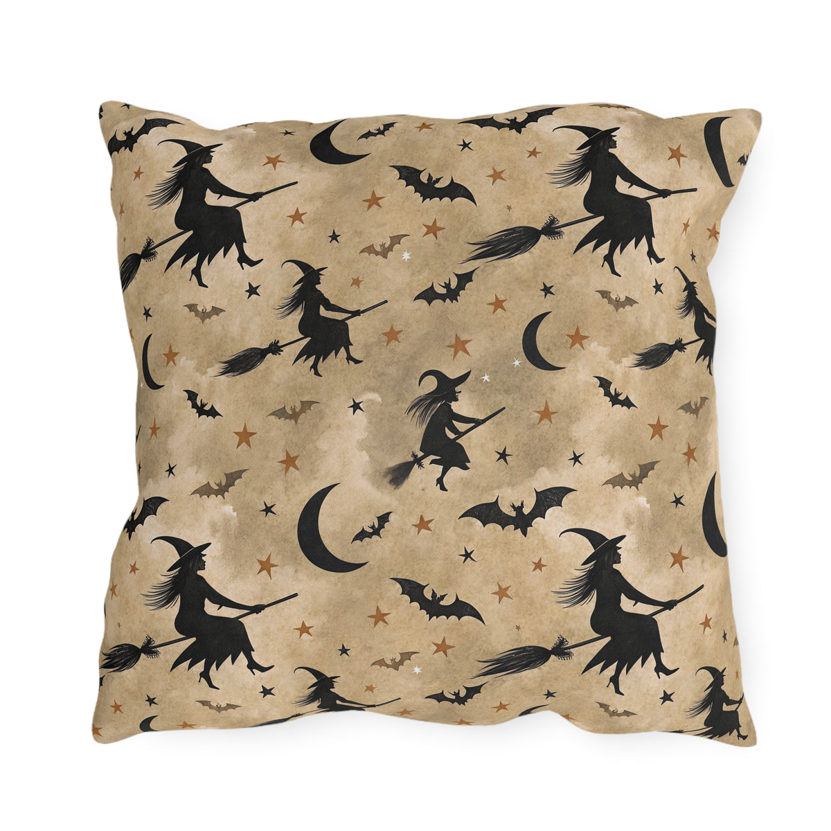 Black witch silhouettes on broomsticks with bats and crescent moons on tan outdoor pillow