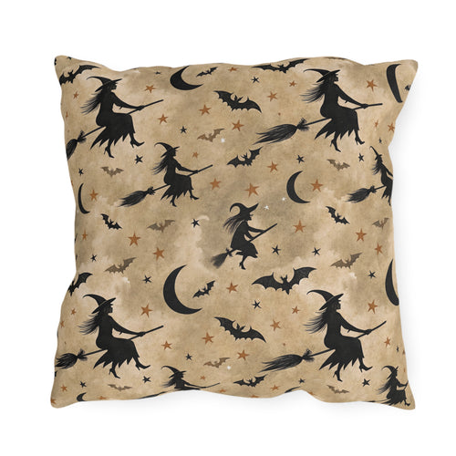 Black witch silhouettes on broomsticks with bats and crescent moons on tan outdoor pillow