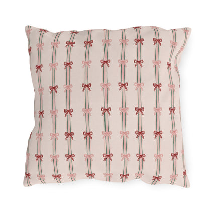 Pink and red ribbon bows on striped blush outdoor pillow