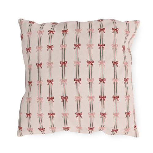 Pink and red ribbon bows on striped blush outdoor pillow