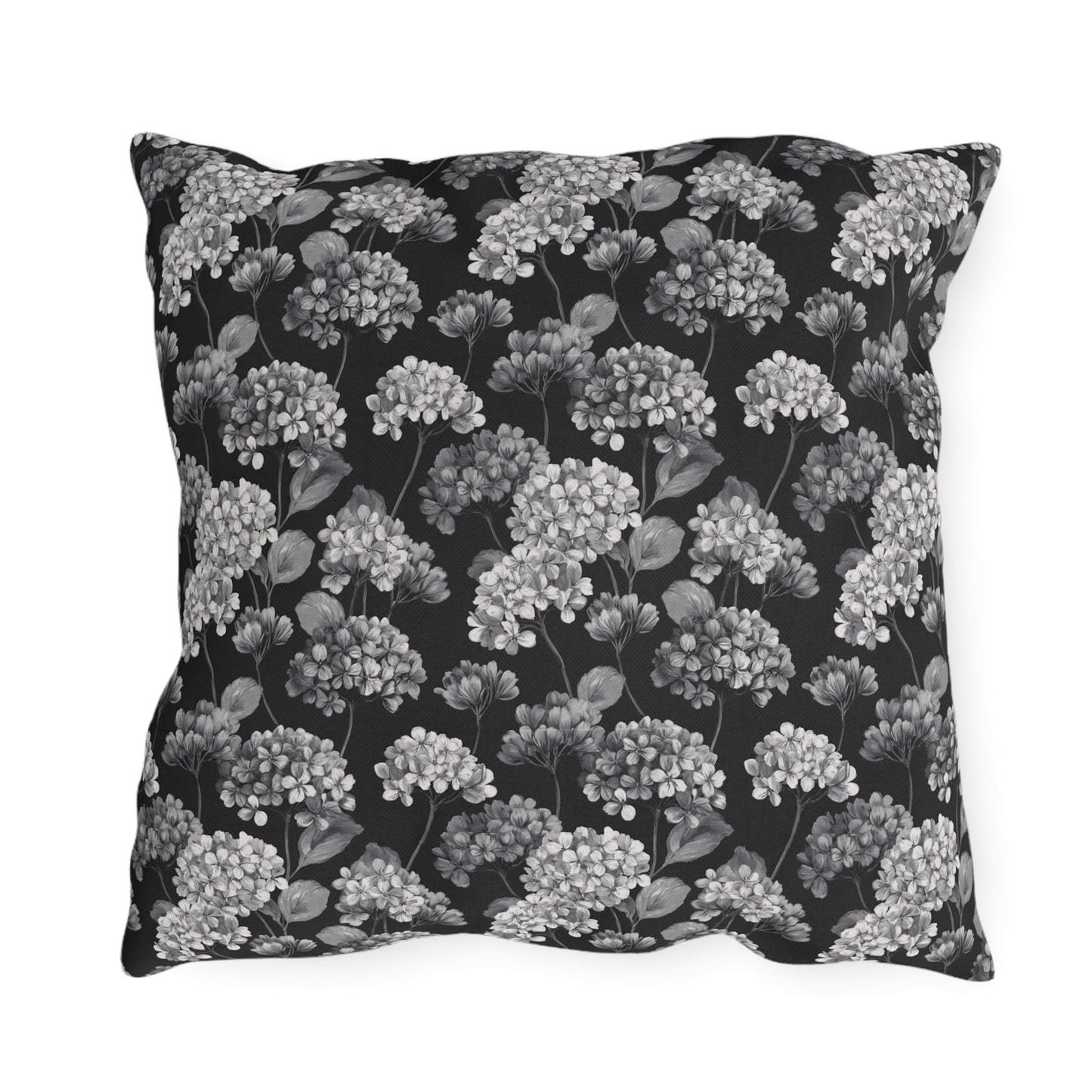 White and grey hydrangeas on black outdoor pillow