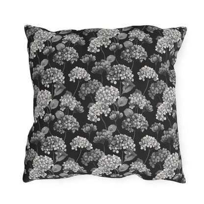 White and grey hydrangeas on black outdoor pillow