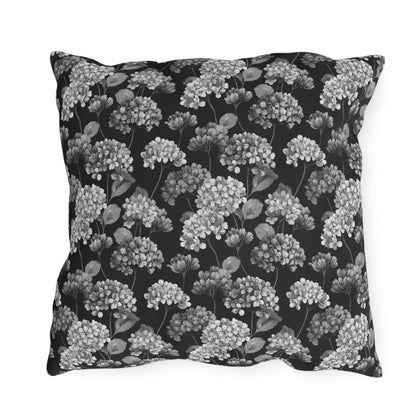White and grey hydrangeas on black outdoor pillow