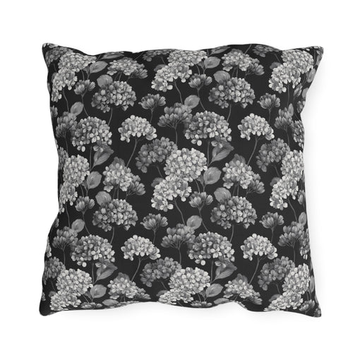 White and grey hydrangeas on black outdoor pillow
