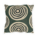 Black and cream concentric rings on a mottled forest green outdoor pillow