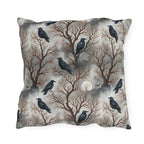 Ravens perched in bare rust branches with a full moon on misty grey outdoor pillow