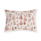 Pink patterned Christmas trees, deer, gingerbread houses and cocoa mugs on cream outdoor lumbar pillow