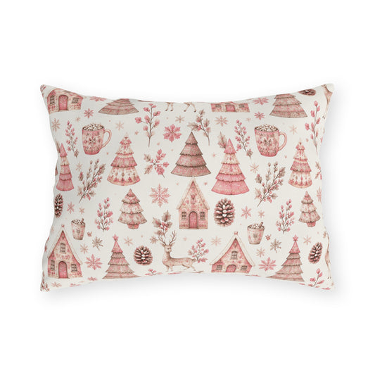 Pink patterned Christmas trees, deer, gingerbread houses and cocoa mugs on cream outdoor lumbar pillow