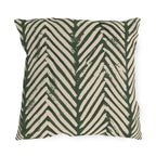 Boho outdoor pillow with hand-painted forest green chevrons on oatmeal