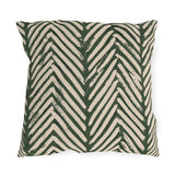 Boho outdoor pillow with hand-painted forest green chevrons on oatmeal