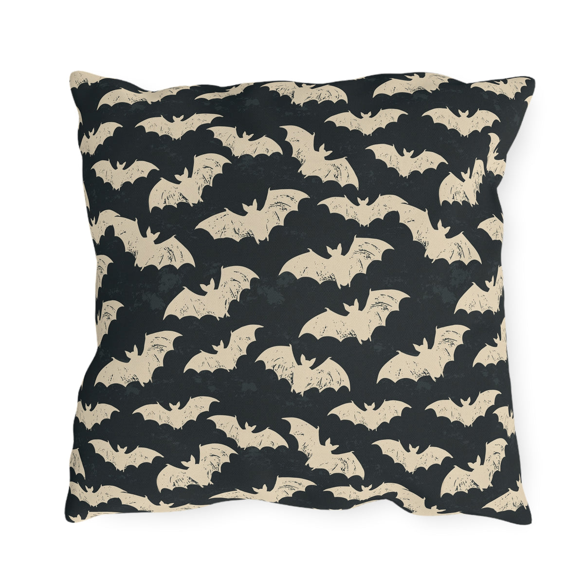 Bone white bats on a charcoal outdoor pillow, worn block print Halloween pattern