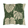 Cream and forest green monstera leaves on sage outdoor pillow