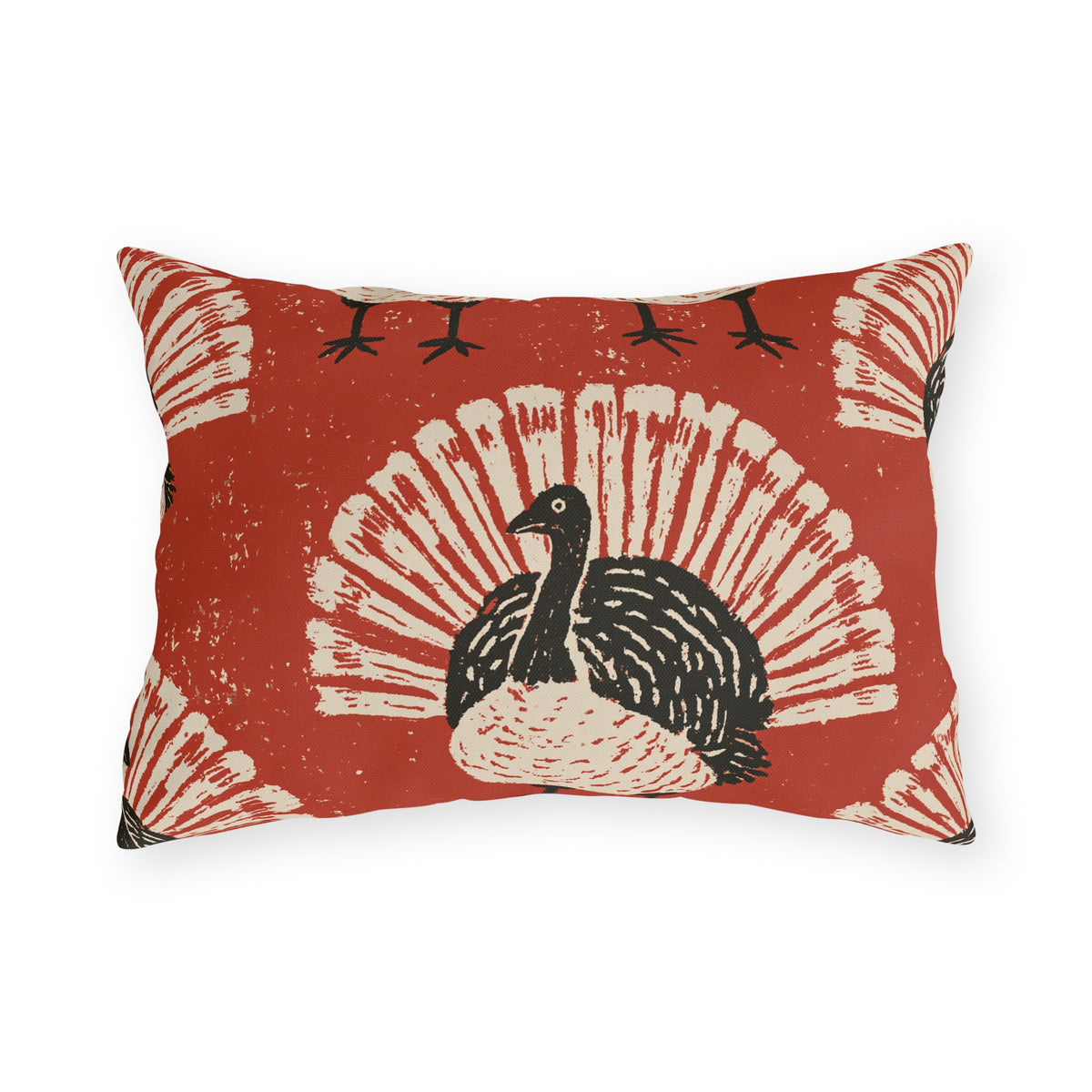 Black and cream block print turkeys on a brick red outdoor lumbar pillow