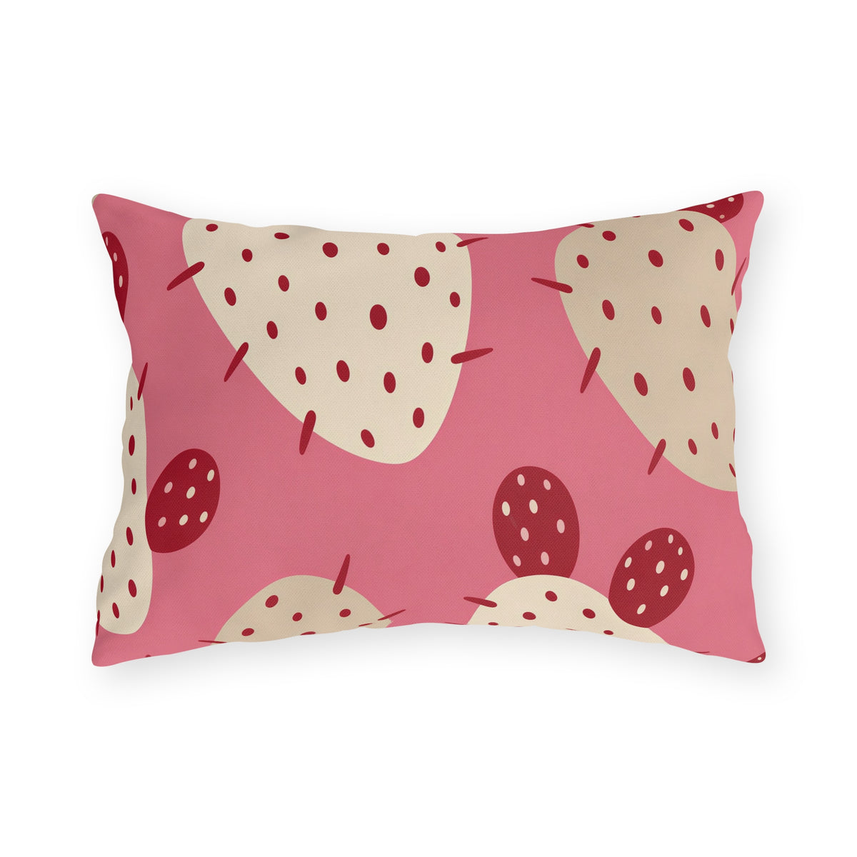 Modern outdoor lumbar pillow with cream and cherry red prickly pear cactus pads on bright pink