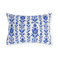 Cobalt blue folk tulip stripes on a white outdoor lumbar pillow