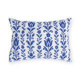 Cobalt blue folk tulip stripes on a white outdoor lumbar pillow