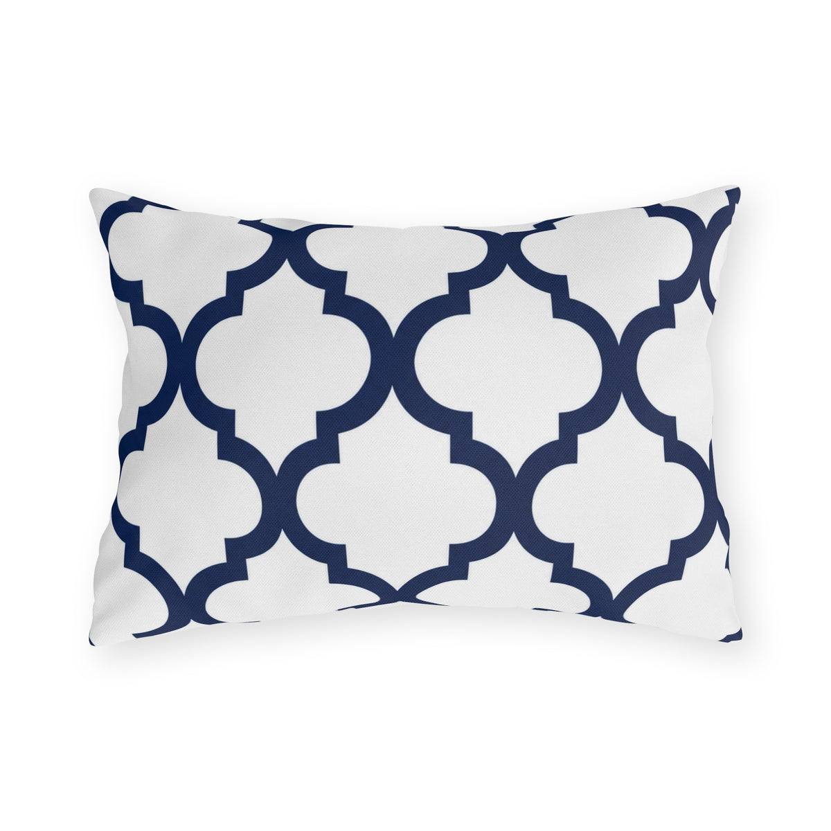 Navy and white quatrefoil outdoor lumbar pillow with a bold Moroccan trellis on crisp white