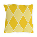 Yellow harlequin diamond outdoor pillow with sunny and butter yellow diamonds and white lines