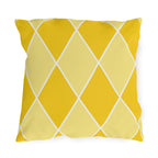 Yellow harlequin diamond outdoor pillow with sunny and butter yellow diamonds and white lines