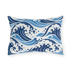Coastal outdoor lumbar pillow with rolling navy and sky blue ocean waves and white foam crests