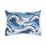 Coastal outdoor lumbar pillow with rolling navy and sky blue ocean waves and white foam crests
