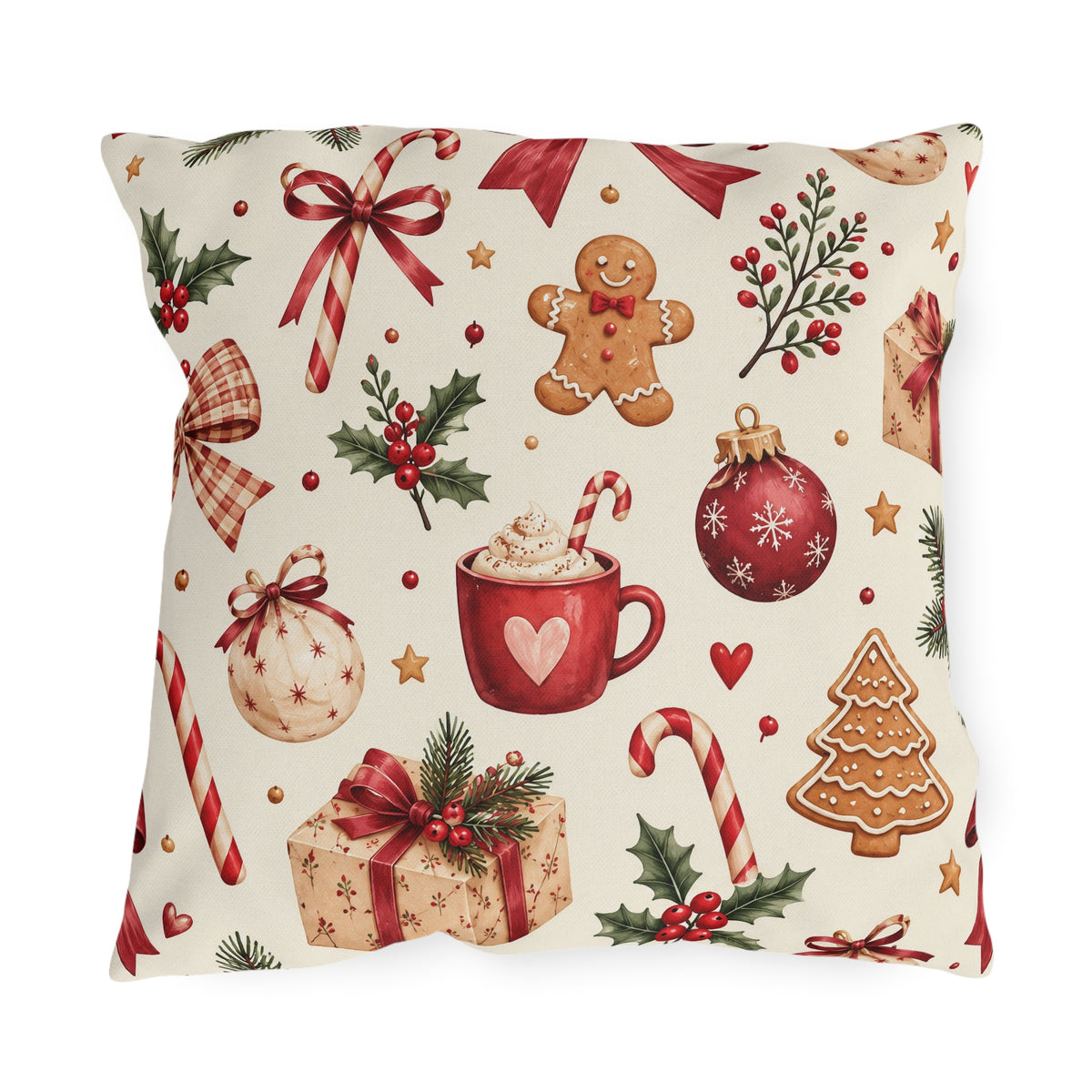 Christmas outdoor pillow with watercolor gingerbread men, candy canes, ornaments, cocoa mug, gifts and holly on cream