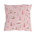 Snow-covered pink cottages and fir trees on pink outdoor pillow