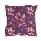 Pink painted magnolias on deep plum purple outdoor pillow