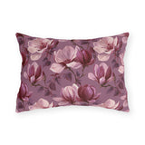 Blush and burgundy painted magnolias on mauve outdoor lumbar pillow