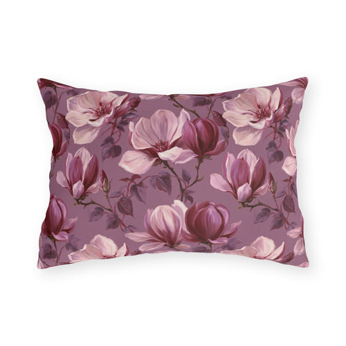 Blush and burgundy painted magnolias on mauve outdoor lumbar pillow